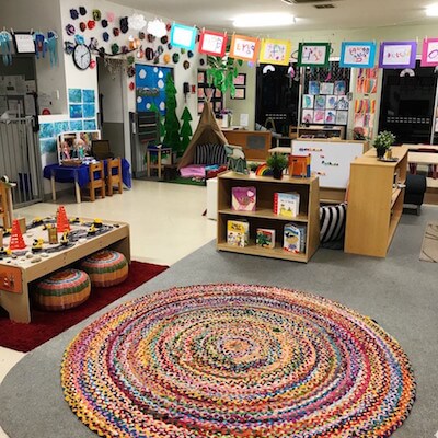 chindi rainbow rug in a classroom